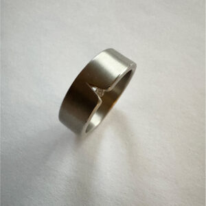 Niessing Ring Kerbe in weissgold mit 1 Brillant